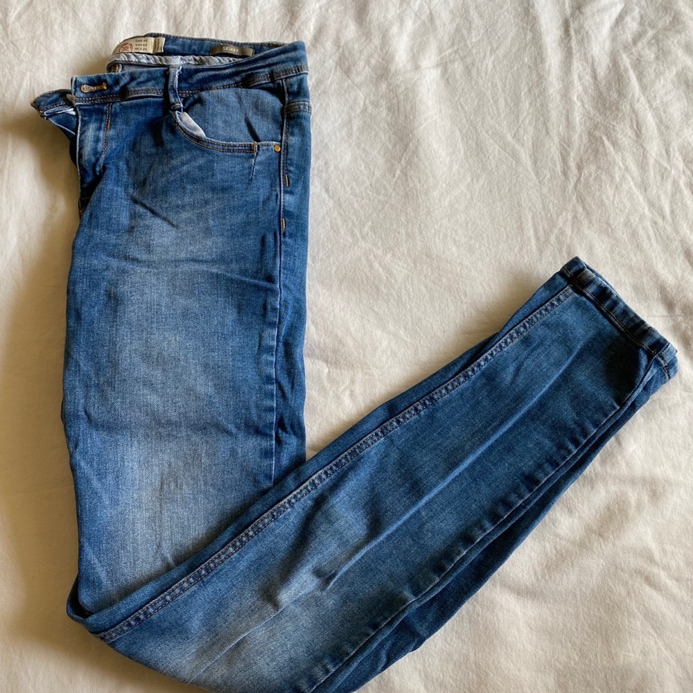 Zara Medium wash low rise distressed jeans